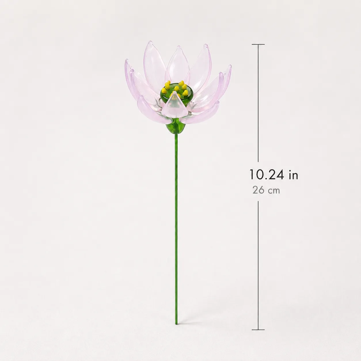 Handmade glass pale pink water lily flower with translucent petals and yellow center Handmade glass pale pink water lily flower with translucent petals and yellow center